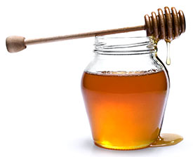 miele biologico per la preparazione della ricetta anti-cancro di Padre Romano Zago